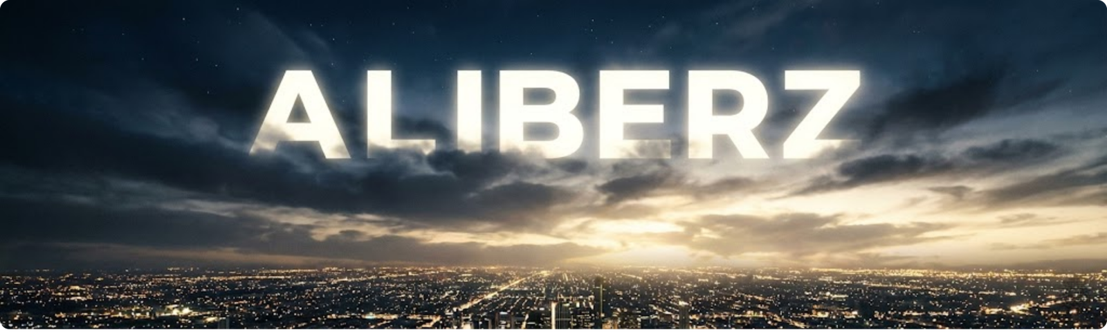 ALIBERZ brand name glowing above a futuristic skyline during twilight.